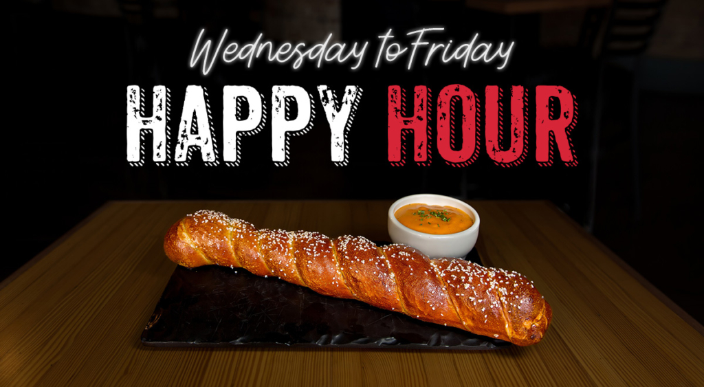 Promotional image of big soft pretzel appetizer for happy hour.